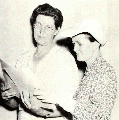 Miss Jean Peoples, left, looks over the history of the Society's 35 years, prepared by Mrs. John Wills, right; Photo from The Delaware County Advocate, July 1942