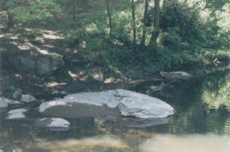 Rock along side of stone arch bridge in Chester Park; Picture courtesy of Gene "Zac" Zacniewski