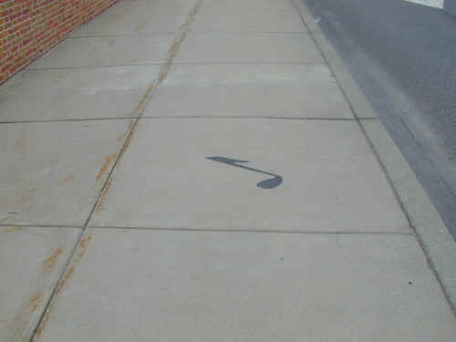 Sidewalk Slabs with Musical Notes; Photo courtesy of "Joker" Jack Chambers, April 2001