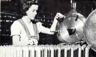 Beatrice McCallister, printing designs on the tubes; Photo from The Delaware County Advocate, October 1940