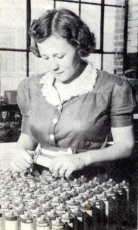 Mary Bradley, screwing caps on tubes; Photo from The Delaware County Advocate, October 1940